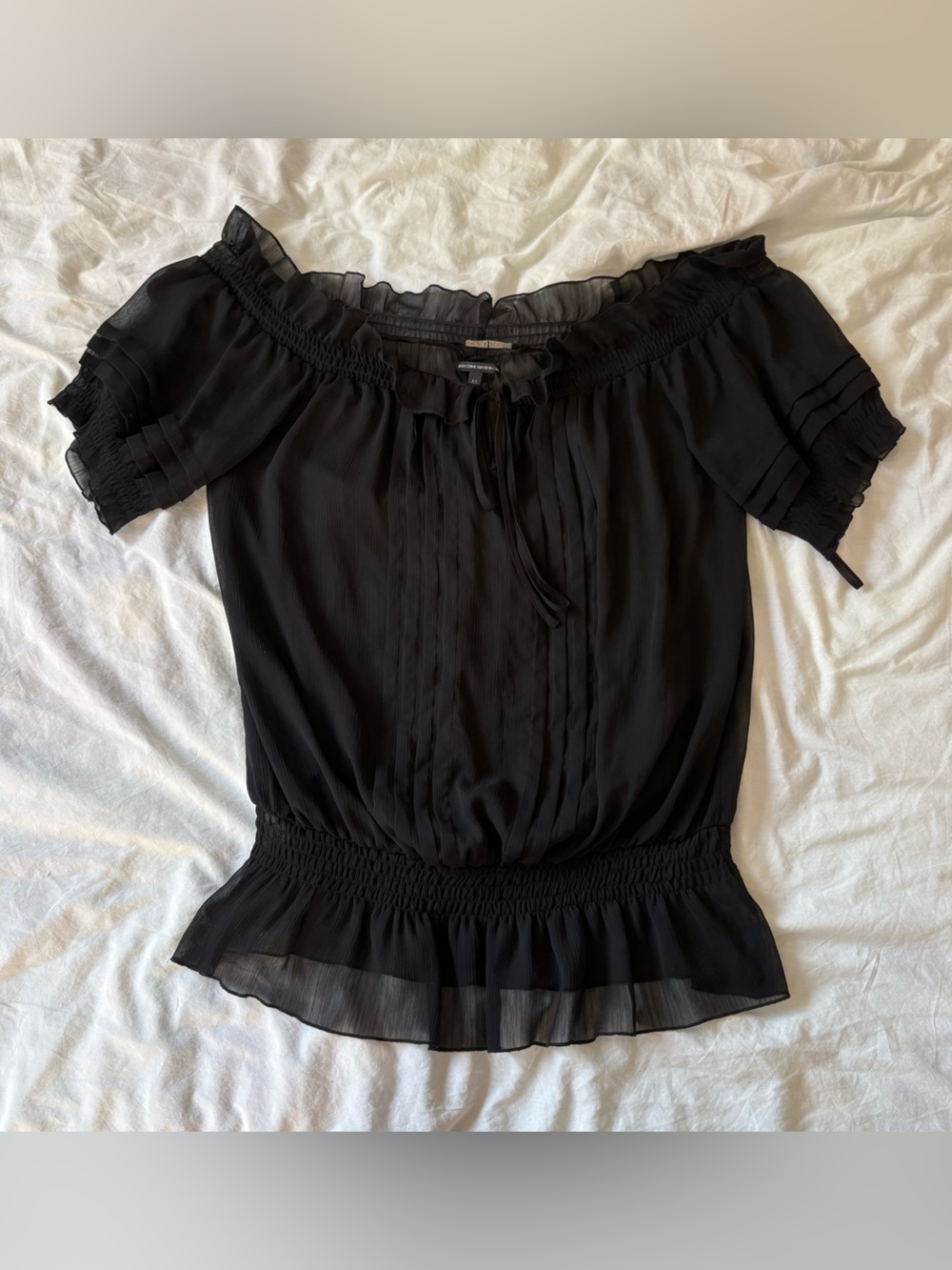 Nicole Benisti black ruffle top